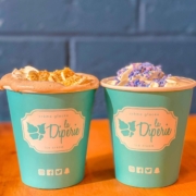 S’mores hot chocolate topped with Graham crumbs and white hot chocolate topped with cotton candy from La Diperie in Toronto