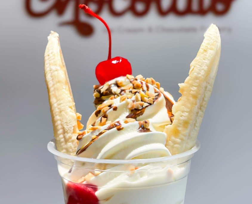 Banana split ice cream sundae with a cherry on top from Chocolato