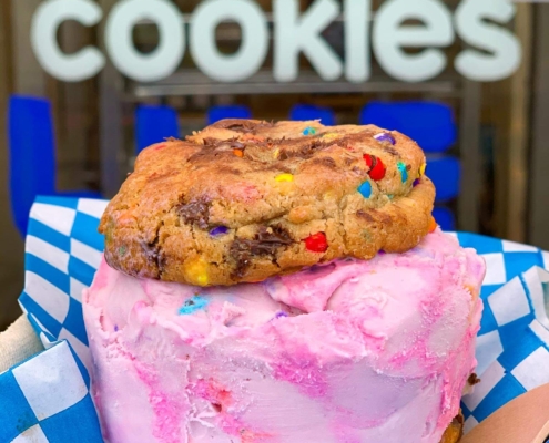 Craig’s Cookies unicorn ice cream sandwich with two rainbow chocolate chip cookies