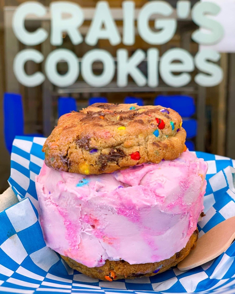 Craig’s Cookies unicorn ice cream sandwich with two rainbow chocolate chip cookies