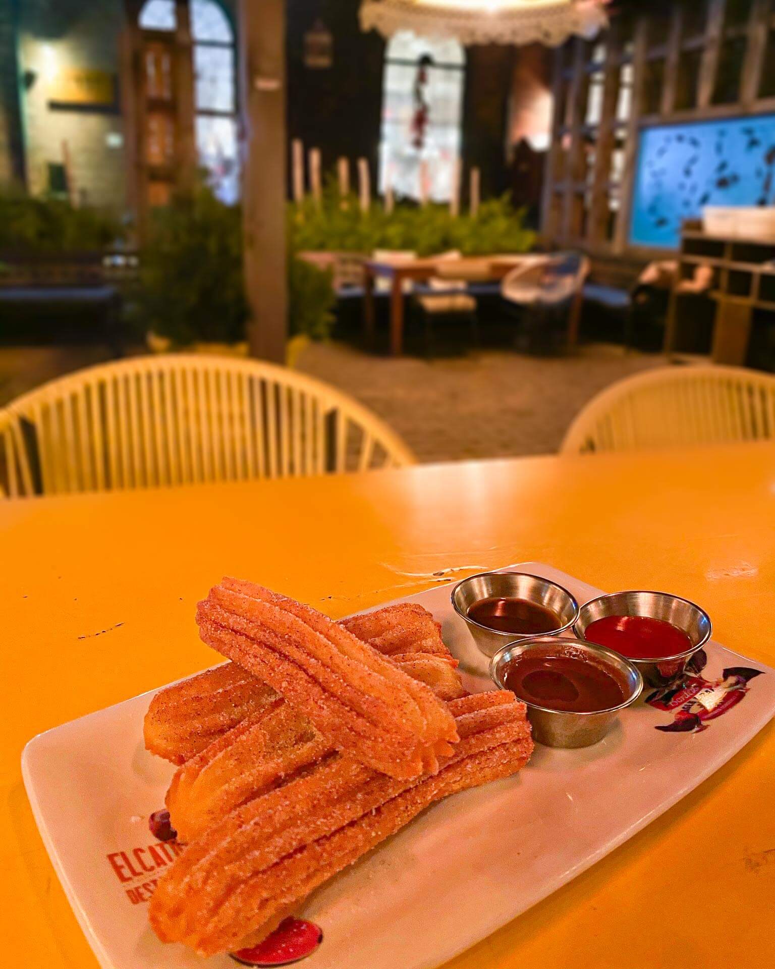 El Catrin’s famous churros with a side of three dips