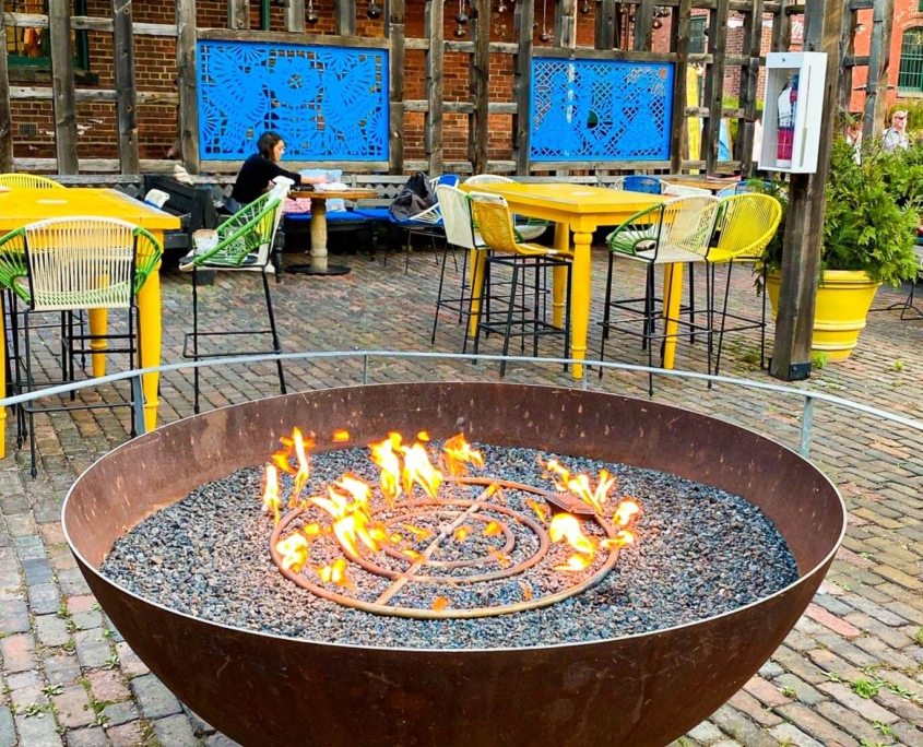 El Catrin’s heated outdoor patio with a fire pit in the middle that sets an ambiance