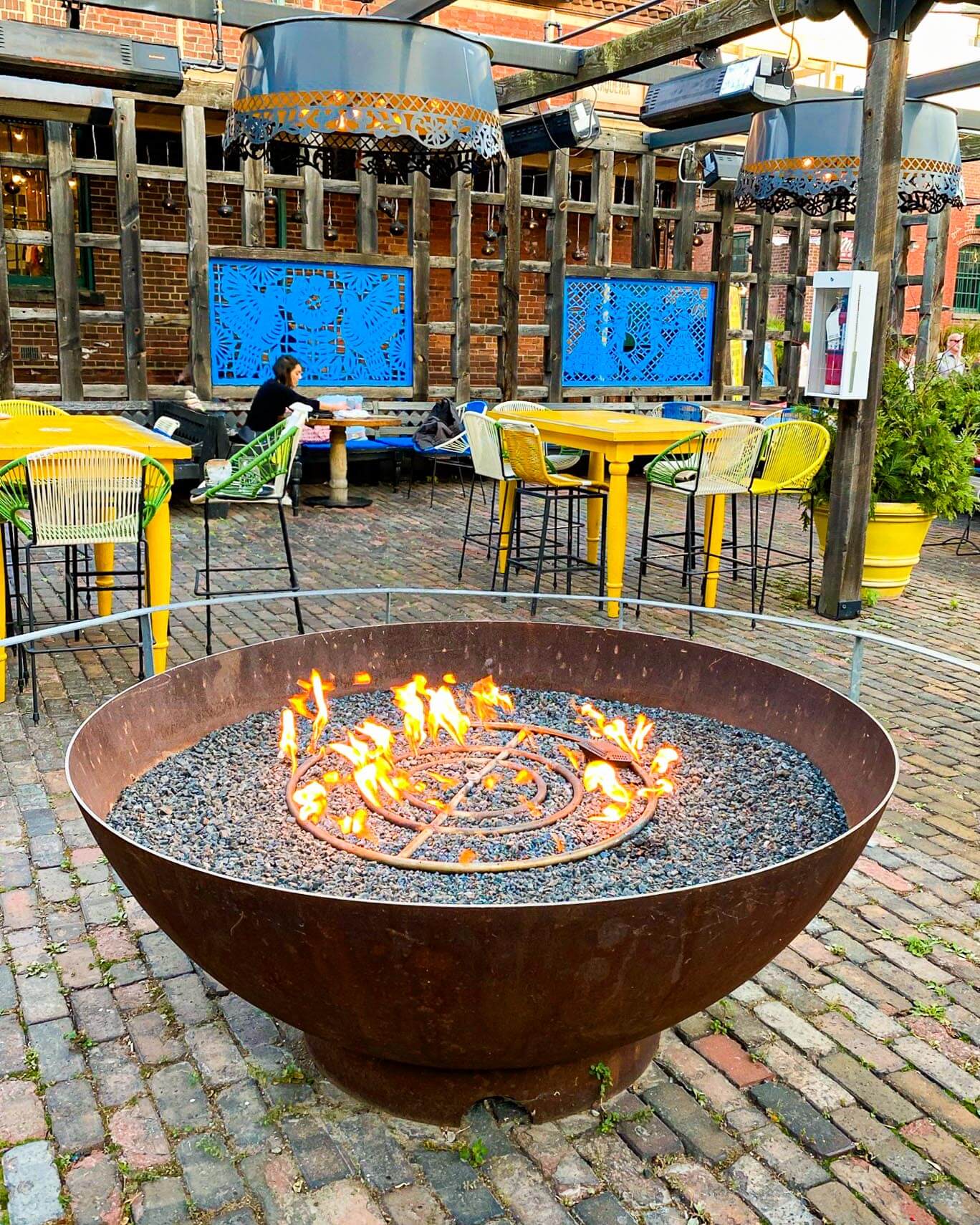 El Catrin’s heated outdoor patio with a fire pit in the middle that sets an ambiance