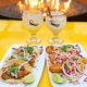 Chicken tacos with margarita and horchata colada in front of a fire pit on El Catrin’s heated outdoor patio in Toronto