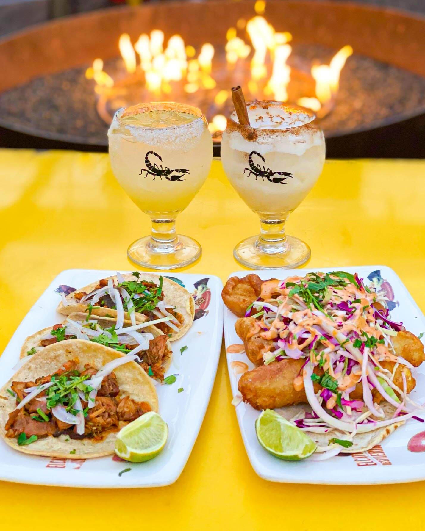 Chicken tacos with margarita and horchata colada in front of a fire pit on El Catrin’s heated outdoor patio in Toronto